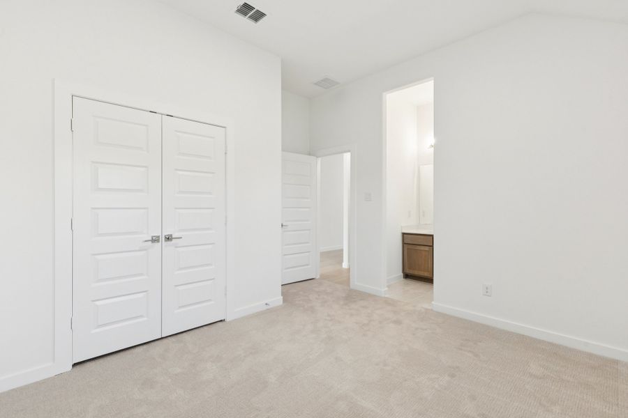 Bedroom in the Gilmour II home plan by Trophy Signature Homes – REPRESENTATIVE PHOTO