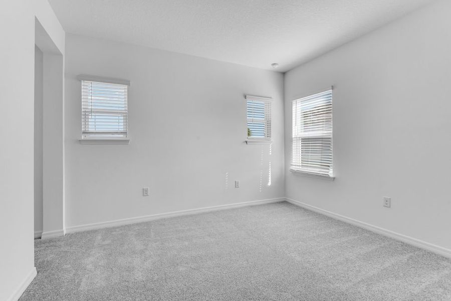 Spacious, unfurnished interior of a new home in Ardisia Park, New Smyrna Beach (Image 17).