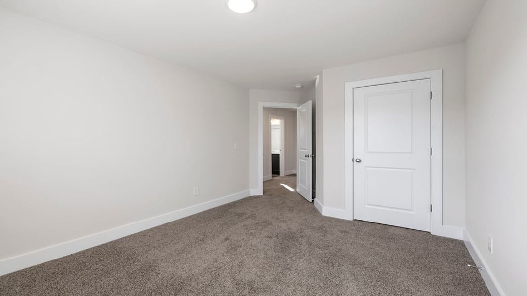 Representative unfurnished interior of a home built from the Phoenix by D.R. Horton in Edgewood Estates, Greenville (Image 23).