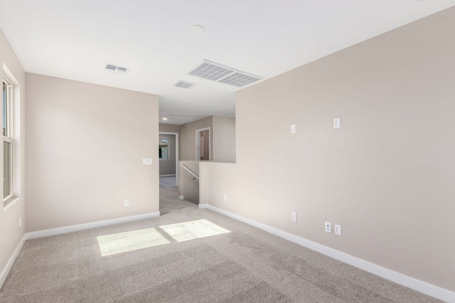 Spacious, unfurnished interior of a new home in Solvida at Estrella, Goodyear (Image 27).
