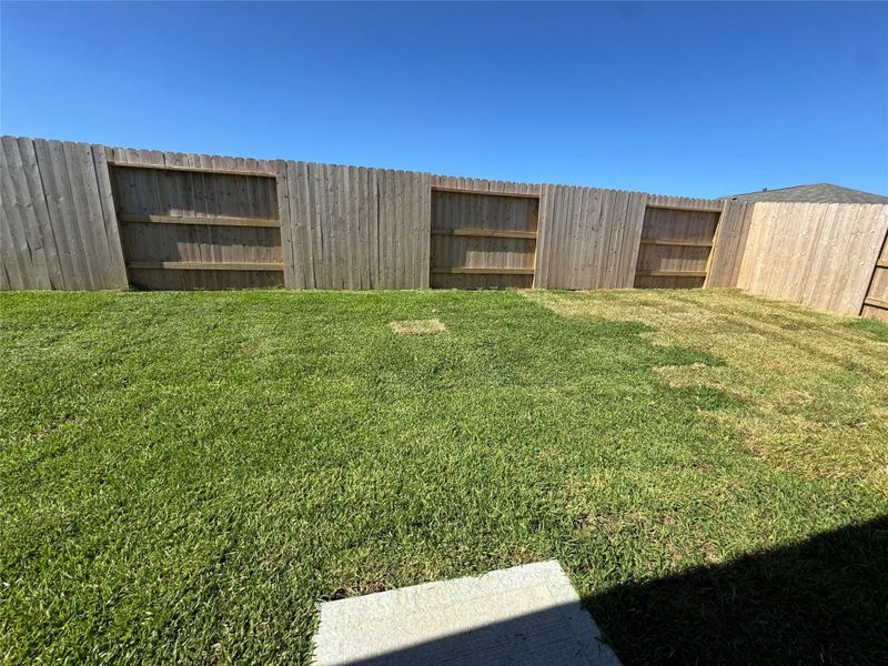 Exterior details and patio area of a home in Magnolia Ridge, Magnolia (Image 2).