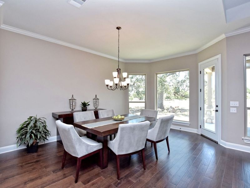 Representative furnished interior of a home built from the San Simeon I by Giddens Homes in Clearwater Ranch, Liberty Hill (Image 262).
