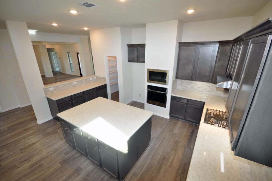Furnished interior view inside a new home in Pedregal, League City (Image 7).