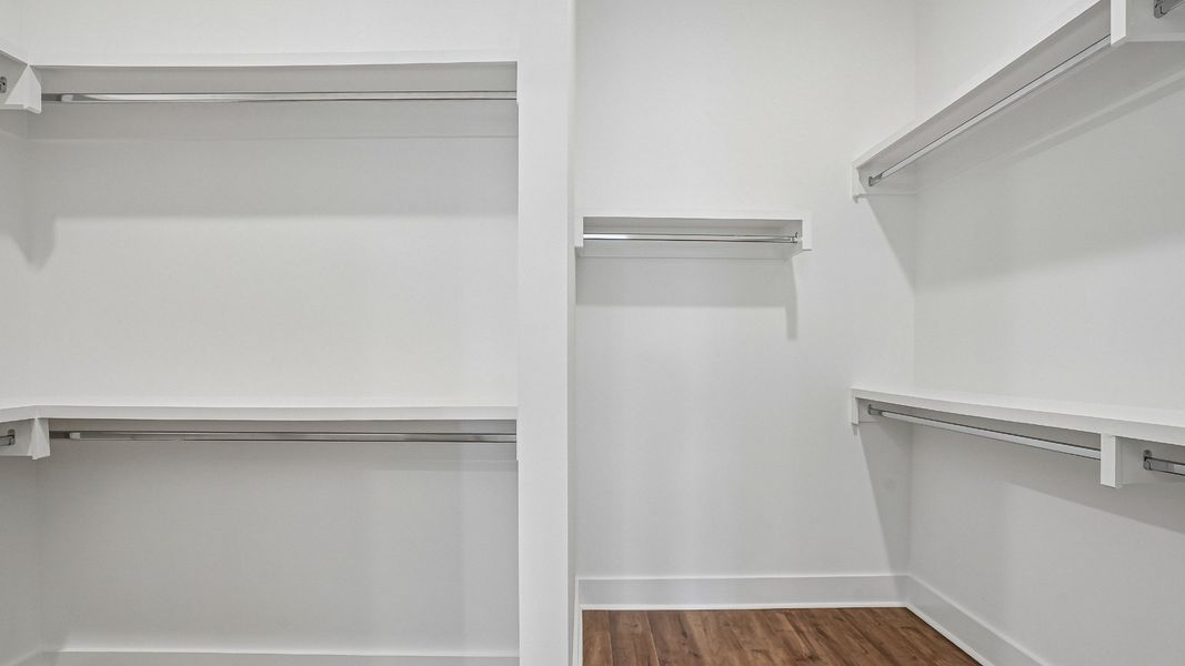 Spacious Walk-In Closet with Upgraded Built-In Shelving Standard!