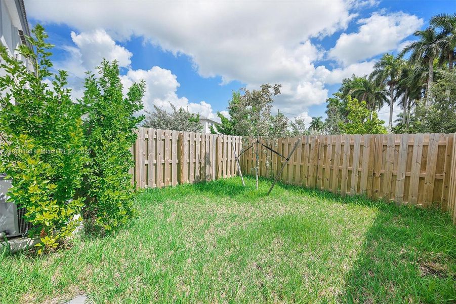 Front exterior of a new home in , Homestead, FL, highlighting curb appeal (Image 21).