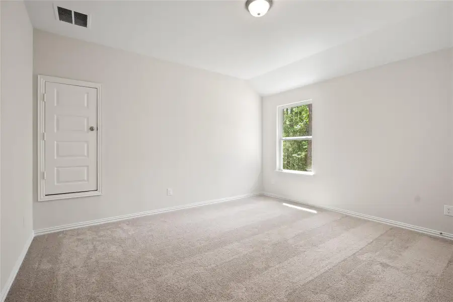 Spacious, unfurnished interior of a new home in The Woodlands Hills, Willis (Image 2). Spacious, unfurnished interior of a new home in The Woodlands Hills, Willis (Image 2).
