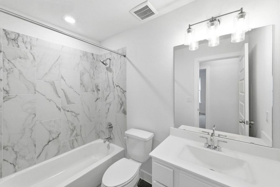 Furnished interior view inside a new home in The Colony, Bastrop (Image 6).
