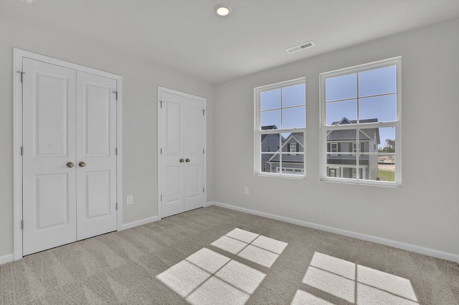 Spacious, unfurnished interior of a new home in River Tide Farms, Bolivia (Image 22).