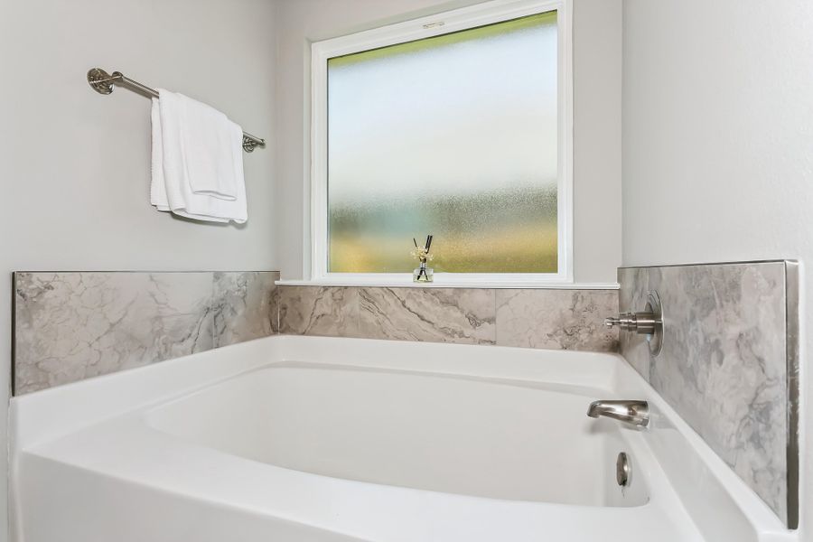 Representative interior finishes for a home built from the The Liberty by Herbst Homes in Buckeyes Landing, Navarre (Image 21).
