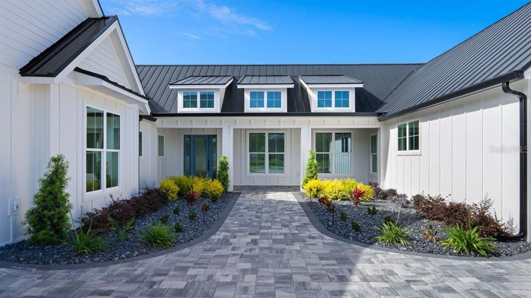 Exterior details and patio area of a home in , Port Orange (Image 40).