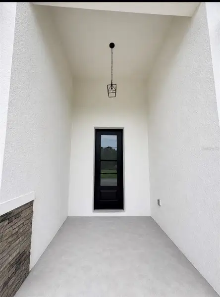 Exterior details and patio area of a home in , Palm Bay (Image 4).
