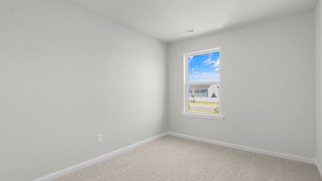 Spacious, unfurnished interior of a new home in The Townes at Belle Grove, Wendell (Image 26).