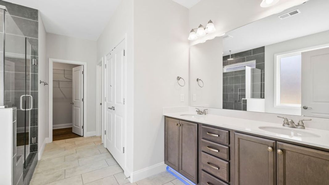Representative furnished interior of a home built from the Crestone by D.R. Horton in Blue Ridge Trail, Fountain Inn (Image 10).