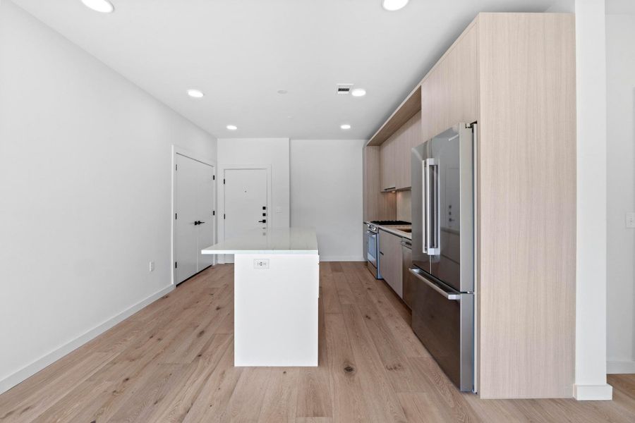 Furnished interior view inside a new home in One Oak, Austin (Image 8).