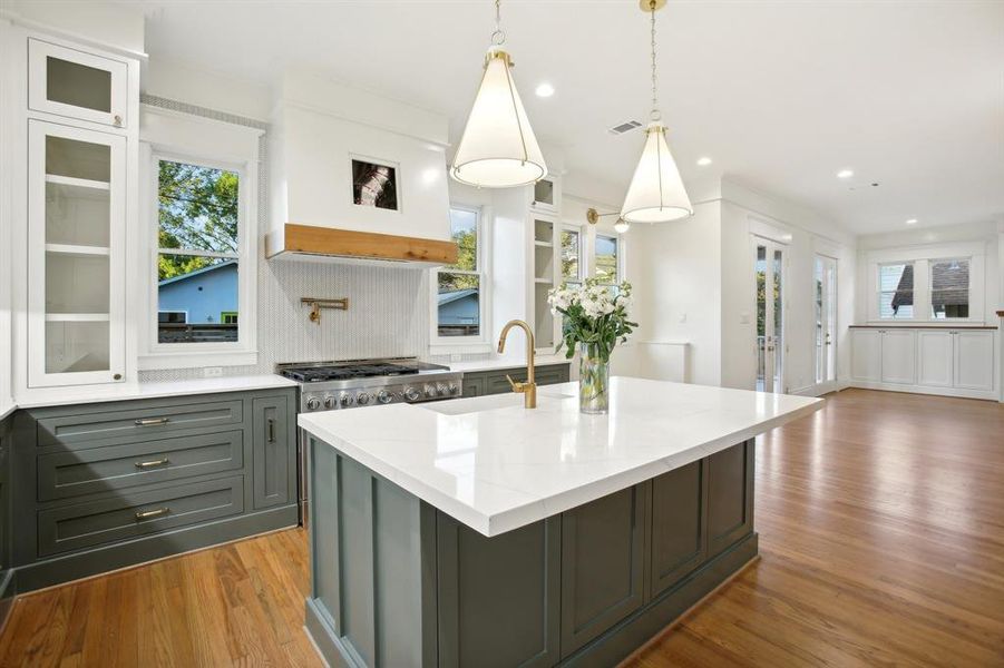 The kitchen is open to the family room, partially pictured to the right.