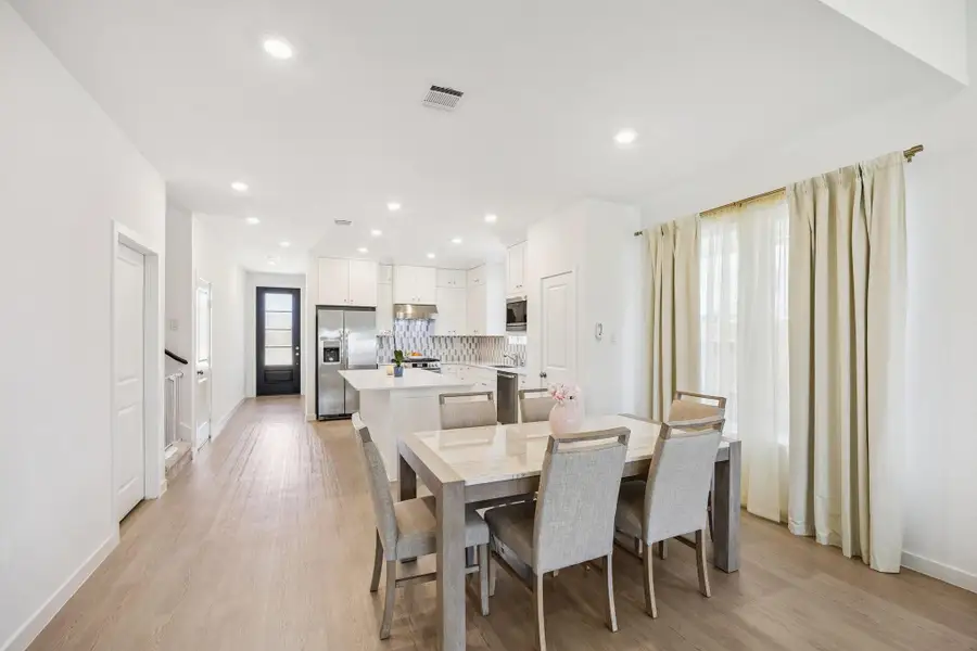 Alternate view of Dining area that leads to the front entrance Alternate view of Dining area that leads to the front entrance