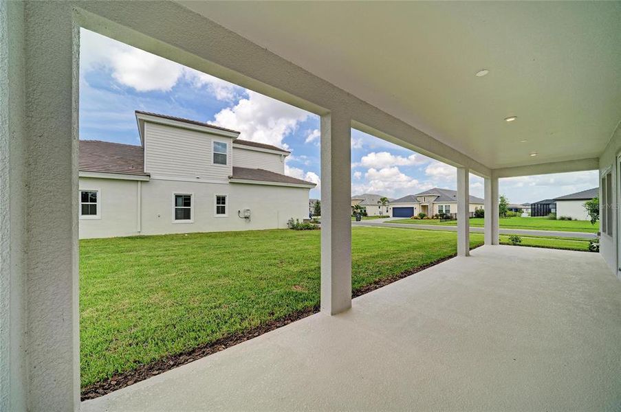 Exterior details and patio area of a home in North River Ranch, Parrish (Image 25).