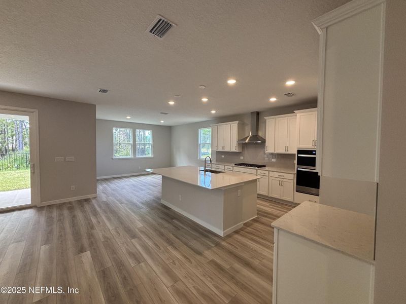 Furnished interior view inside a new home in The Cypress Series at Reserve East, Flagler Beach (Image 4).
