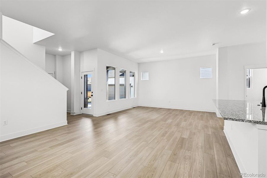 Spacious, unfurnished interior of a new home in Painted Prairie Cottage, Aurora (Image 17).