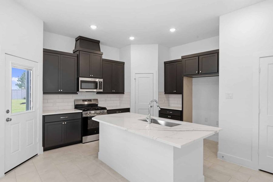 Furnished interior view inside a new home in Bridgeland, Cypress (Image 5).