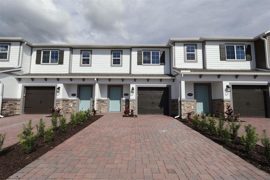 Exterior details and patio area of a home in Eden at Crossprairie, St. Cloud (Image 3). Exterior details and patio area of a home in Eden at Crossprairie, St. Cloud (Image 3).