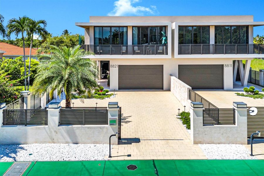 Front exterior of a new home in , Miami, FL, highlighting curb appeal (Image 23).
