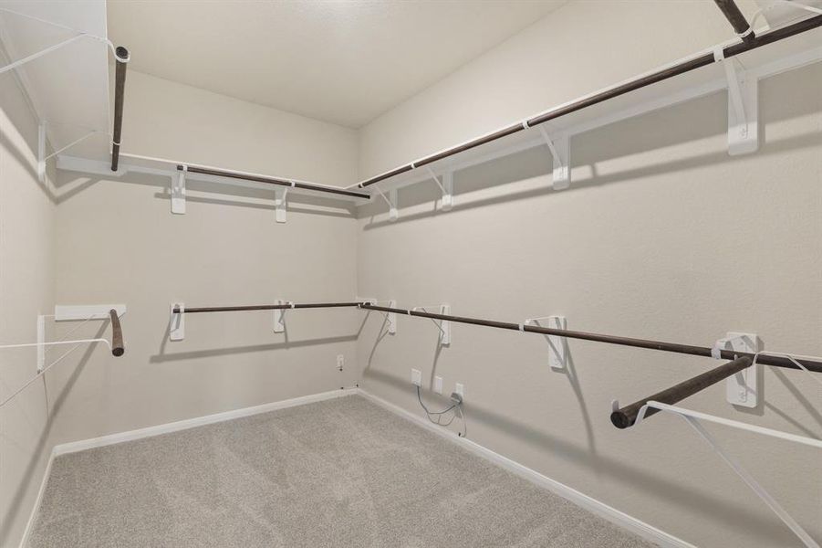 Huge walk-in closet in owner's suite (*Photo not of actual home and used for illustration purposes only.)