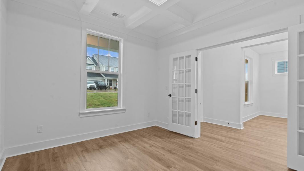 Elegant and flexible French door study ideal for remote work, reading, or creative space