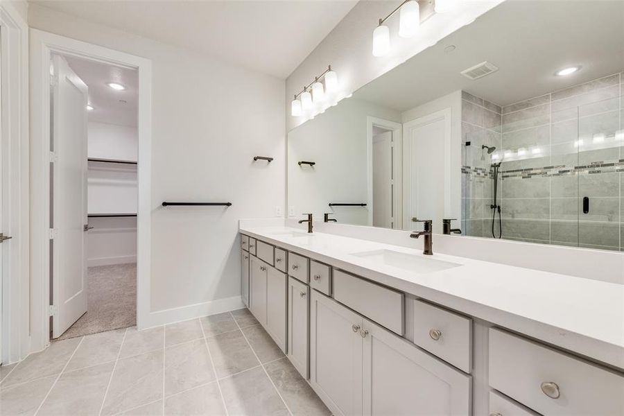 Furnished interior view inside a new home in Collin Creek, Plano (Image 9).