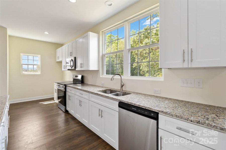 Furnished interior view inside a new home in , Monroe (Image 11).