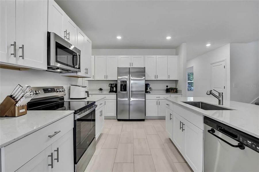 Furnished interior view inside a new home in Angeline: The Estates, Land O' Lakes (Image 33).