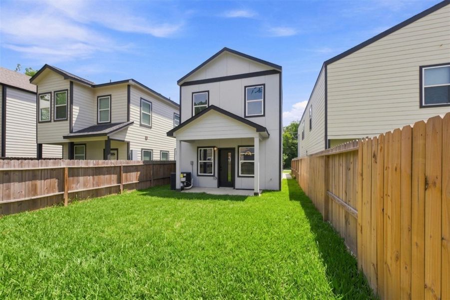 Exterior details and patio area of a home in , Houston (Image 3).