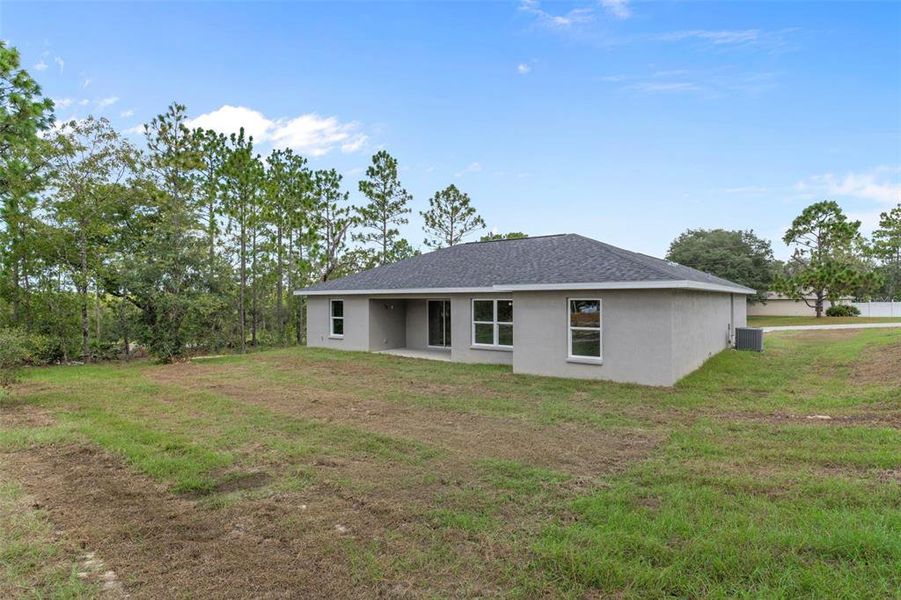 Front exterior of a new home in , Dunnellon, FL, highlighting curb appeal (Image 2).