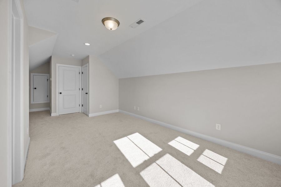Spacious, unfurnished interior of a new home in The Preserve at Langston, Winterville (Image 52).