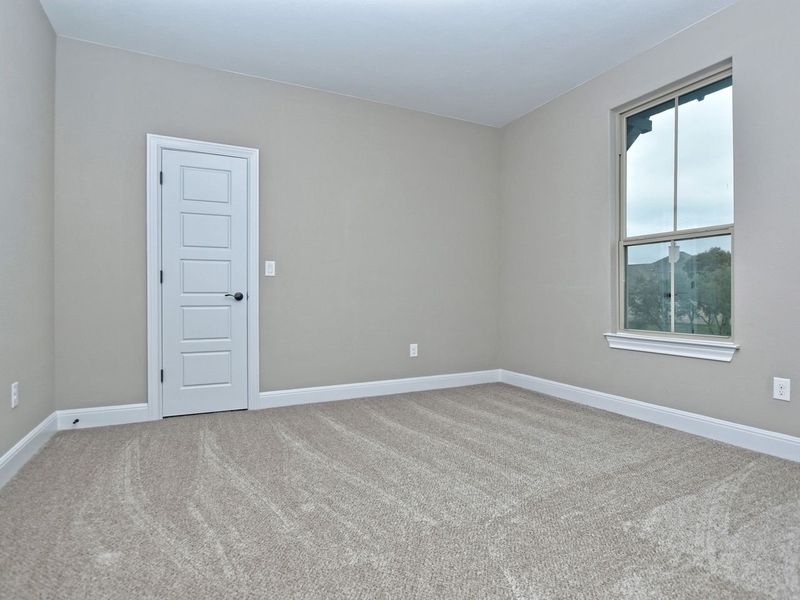 Representative unfurnished interior of a home built from the Madera II by Giddens Homes in Scofield Farms Estates, Georgetown (Image 407).