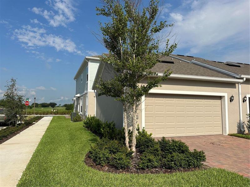 Front exterior of a new home in , Winter Garden, FL, highlighting curb appeal (Image 16). Front exterior of a new home in , Winter Garden, FL, highlighting curb appeal (Image 16).