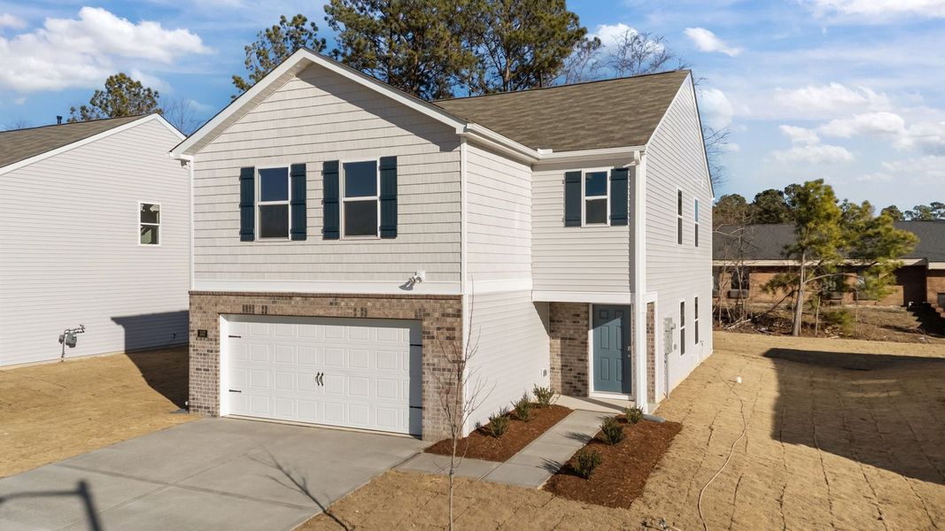 Front exterior of a new home in Hunter Hill, Rocky Mount, NC, highlighting curb appeal (Image 18).