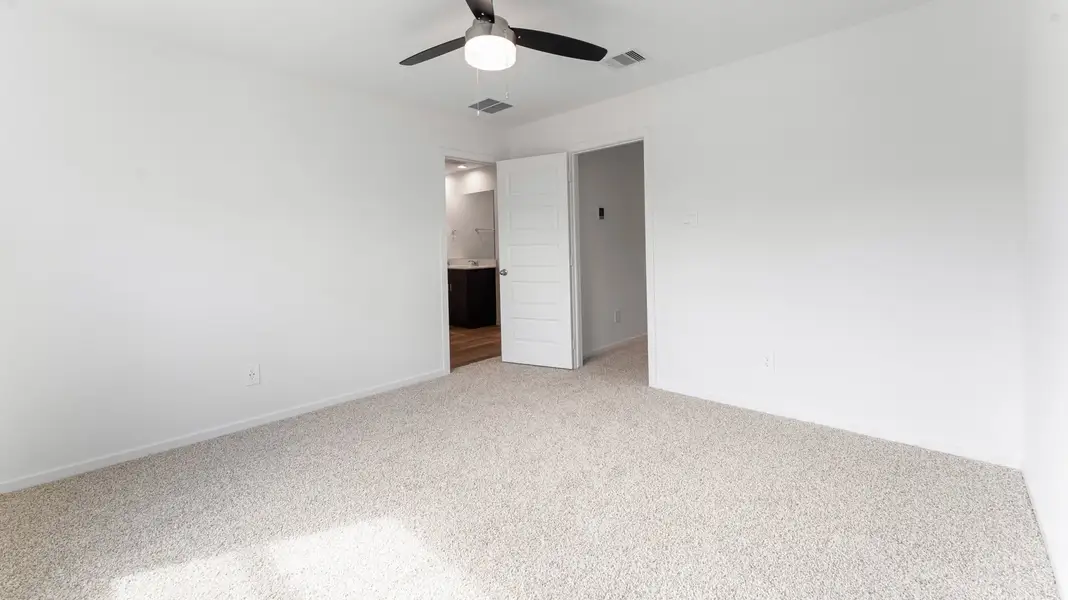 Representative unfurnished interior of a home built from the DOVE by D.R. Horton in Alaia Crossing, Houston (Image 13). Representative unfurnished interior of a home built from the DOVE by D.R. Horton in Alaia Crossing, Houston (Image 13).