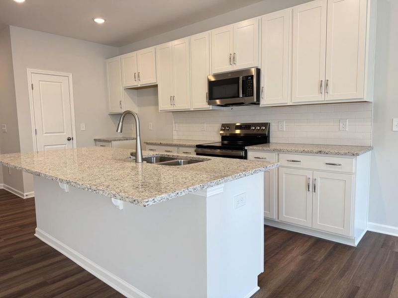 Furnished interior view inside a new home in East Main Townes, Spartanburg (Image 5).