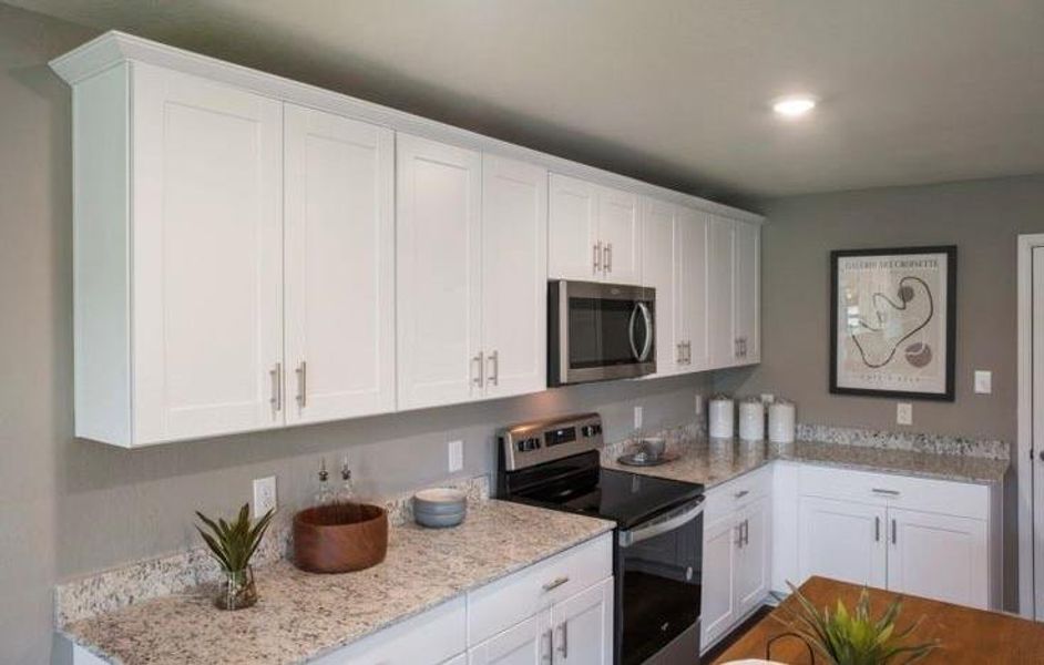 Furnished interior view inside a new home in The Pines At Seven Coves, Conroe (Image 4). Furnished interior view inside a new home in The Pines At Seven Coves, Conroe (Image 4).