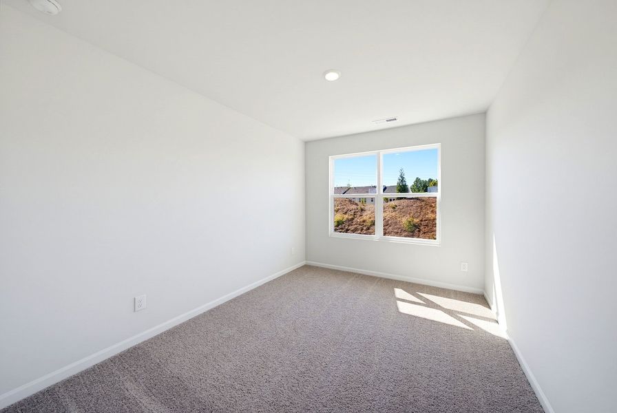 Spacious, unfurnished interior of a new home in Sweetbrier, Durham (Image 23).