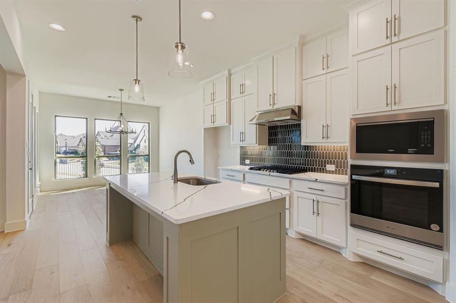 Furnished interior view inside a new home in Reunion 70s, Rhome (Image 8). Furnished interior view inside a new home in Reunion 70s, Rhome (Image 8).