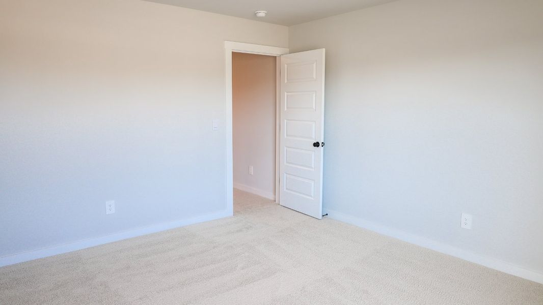 Representative unfurnished interior of a home built from the TISDALE by D.R. Horton in Harvest Point, Spring Hill (Image 59).