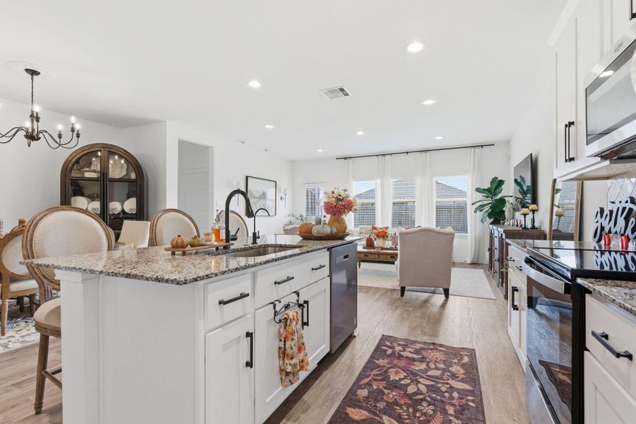 Seamless open-concept layout perfect for modern living and entertaining. Seamless open-concept layout perfect for modern living and entertaining.