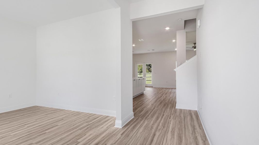 Representative unfurnished interior of a home built from the Carol by D.R. Horton in Holley Grove at Peach Creek, Santa Rosa Beach (Image 4).