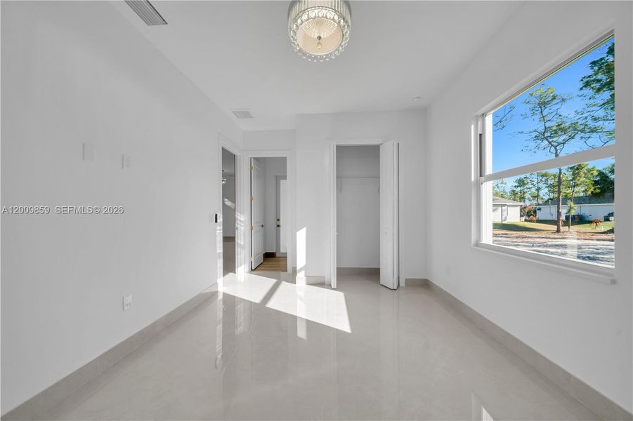 Spacious, unfurnished interior of a new home in , Lehigh Acres (Image 17).