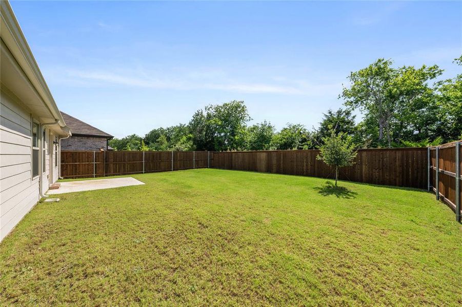 Exterior details and patio area of a home in Lakehaven - Signature Series, Farmersville (Image 22). Exterior details and patio area of a home in Lakehaven - Signature Series, Farmersville (Image 22).