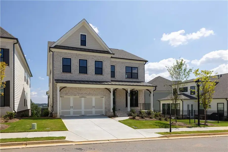 Front exterior of a new home in Waterhaven, Cumming, GA, highlighting curb appeal (Image 26).