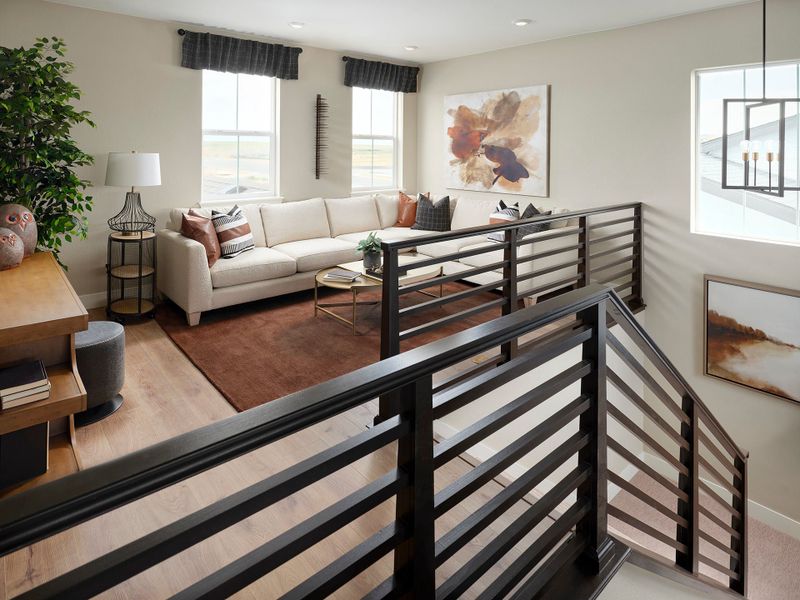 Furnished interior view inside a new home in The Aurora Highlands, Aurora (Image 5).