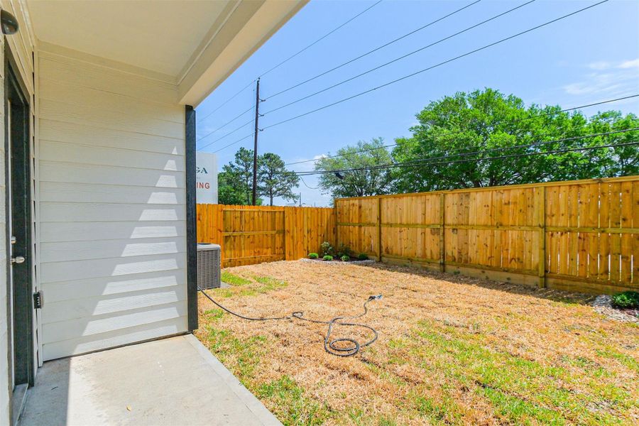Exterior details and patio area of a home in , Houston (Image 3).